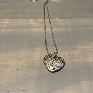 Gorgeous silver heart pendant.
